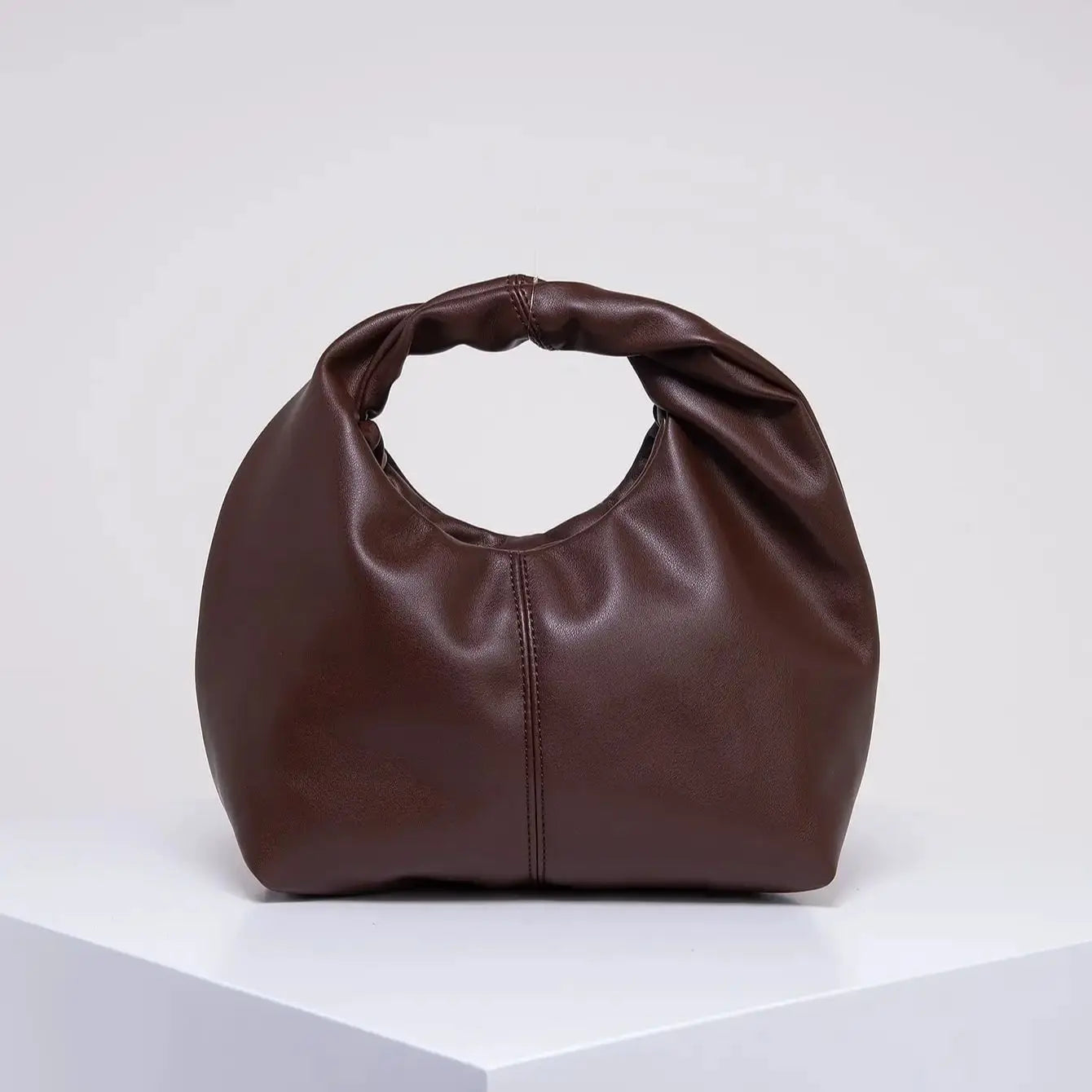 Gelyn Clutch Leather Bag