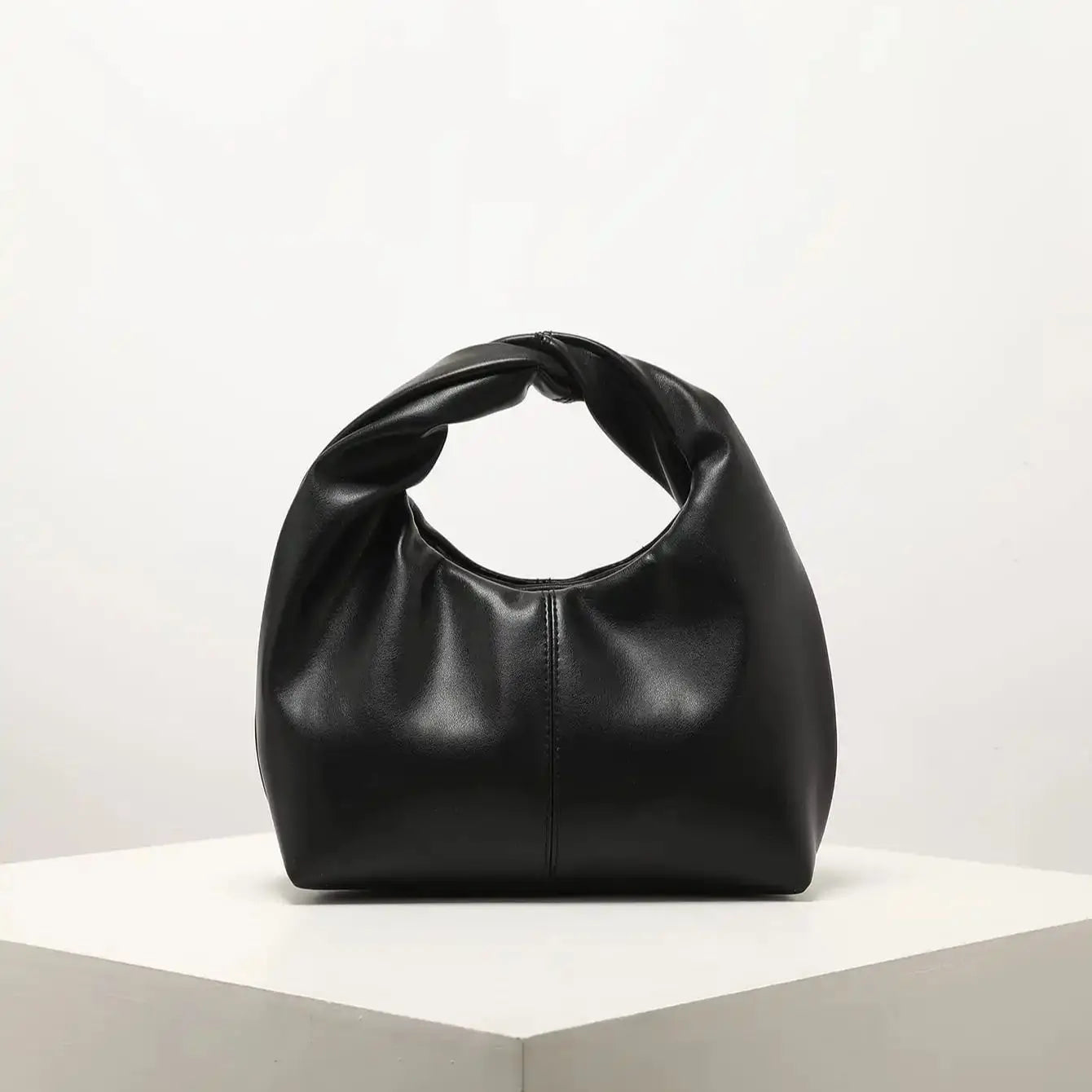 Gelyn Clutch Leather Bag