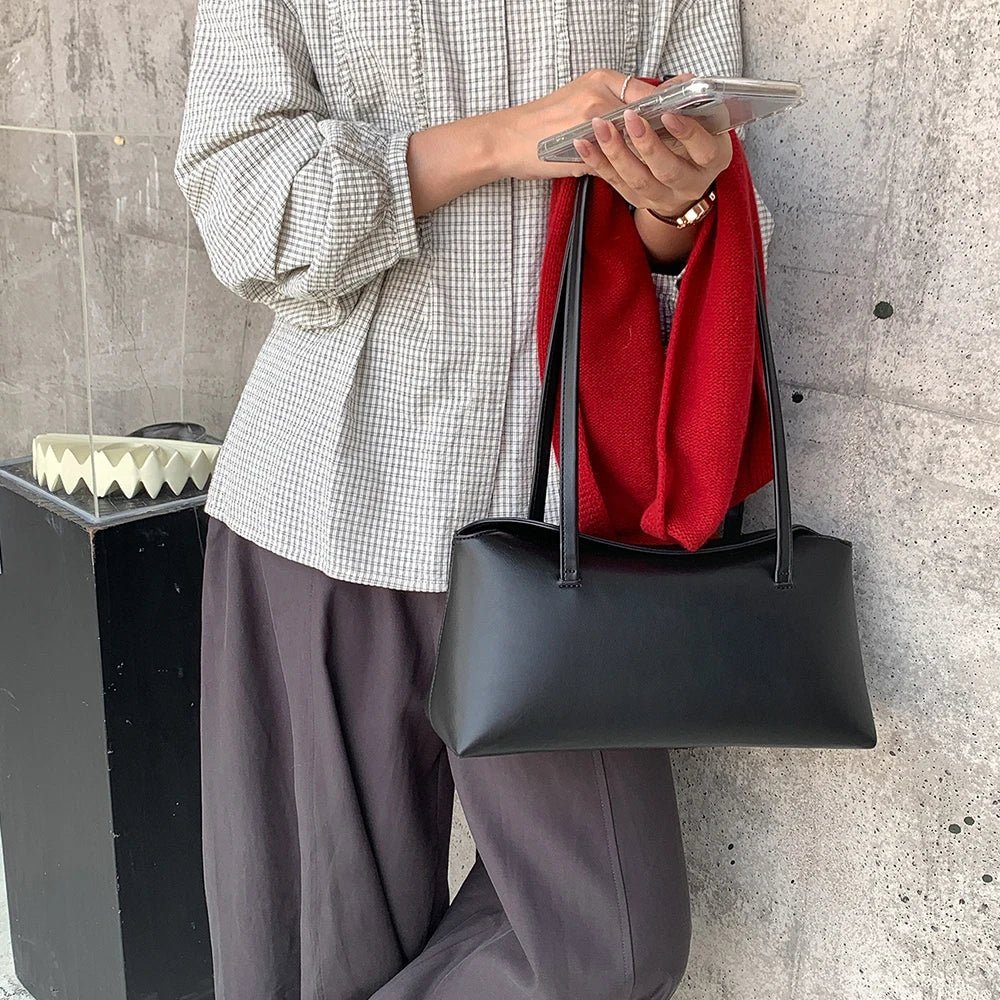 Bianca vattert skulder‑tote